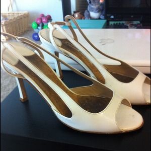 Manolo blahnik white sling black heel.
