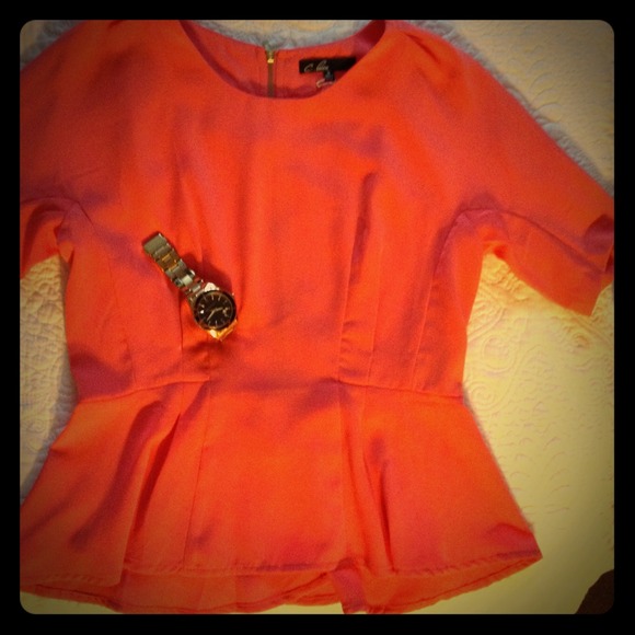 Coral Peplum Top