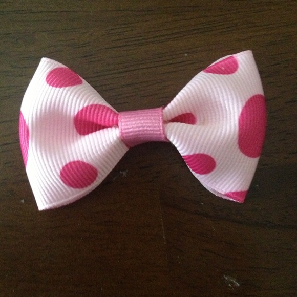 Pink polka dotted bow