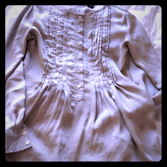 Shimmery sandy colored blouse.