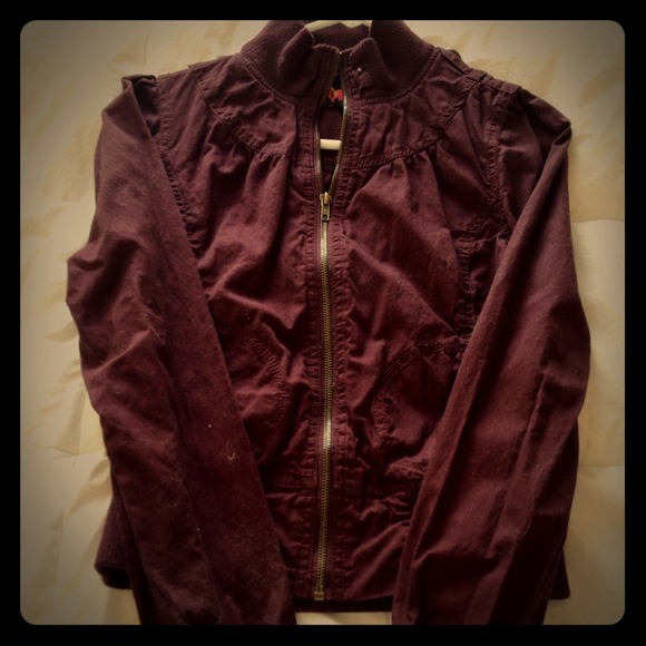 Oxblood jacket.