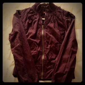 Oxblood jacket.