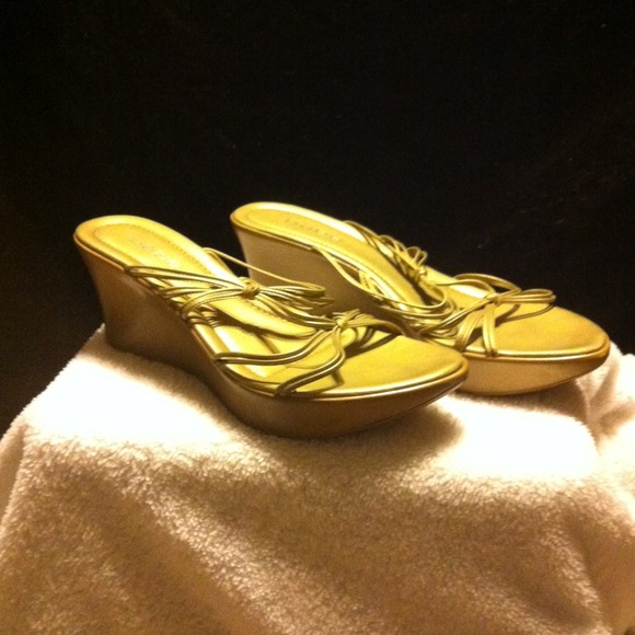 Gold Bebe wedge sandals