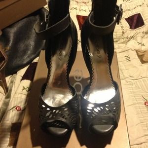 🎈SOLD🎈Bebe black lucie lasercut heels.