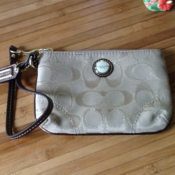 Gifted coach wristlet tan new with tag