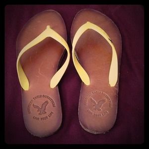 Cute Yellow American eagle flip flops worn once