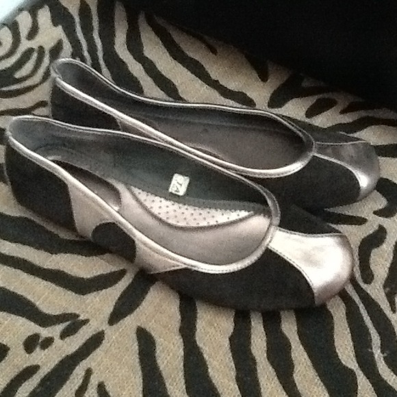 Silver and black flats