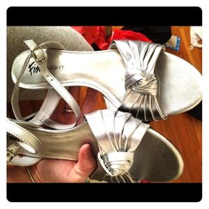 Silver 1 1/2 inch heels.
