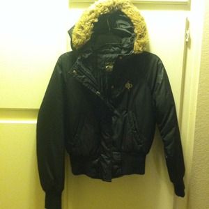 Black hooded jacket trimmed with fur