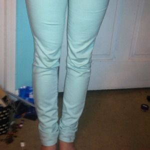 Light blue, size 25 skinny jeans.