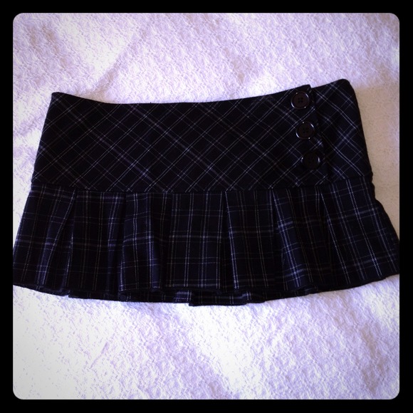 Plaid mini skirt with side button detail