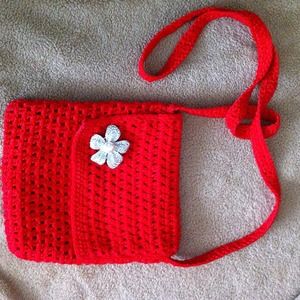 Handbag with premier enhancer/pin