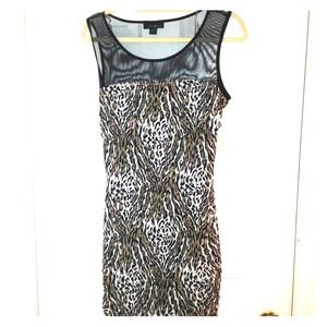 Never been worn cheetah dress. Tags still on
