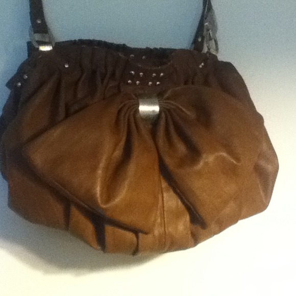 Adorable brown oversized purse with bow and studs!