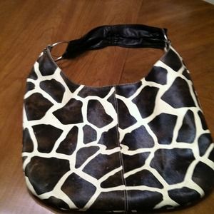 Oversized giraffe print purse