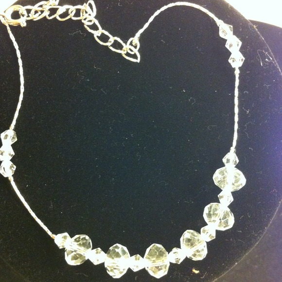 Ankle bracket with clear faceted beads.