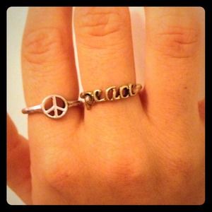 Silver and gold peace sign and lettered ring