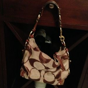Authentic Coach Carly Signature handbag.