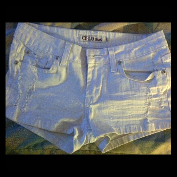 White distressed shorts
