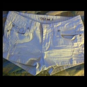 White distressed shorts