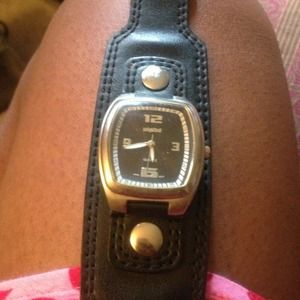 Standout in style! Black, wide band watch.