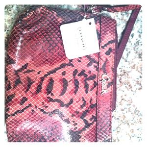 REDUCED!! Magenta snakeskin Coach wristlet