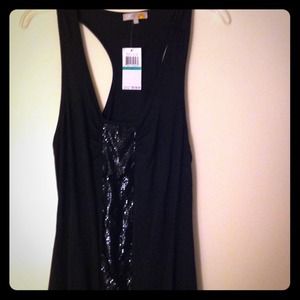 Brand new, C & C California black tunic, size L.