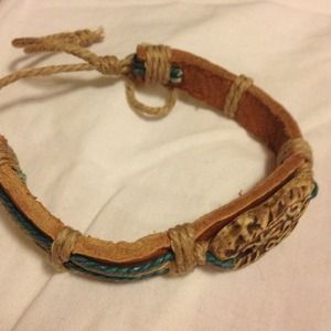 Tribal leather and string bracelet