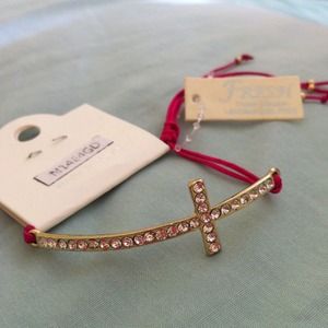 Pink w/ silver sideways cross