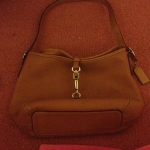 Brown leather coach bag