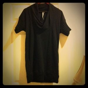 Black sweater dress with swooping neckline