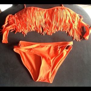 Orange 2 piece fringe bathing suit.