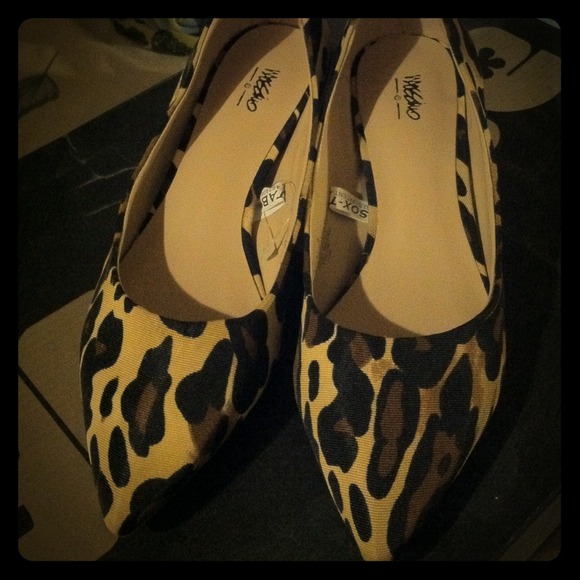 Never worn leopard print shoes with tiny heels
