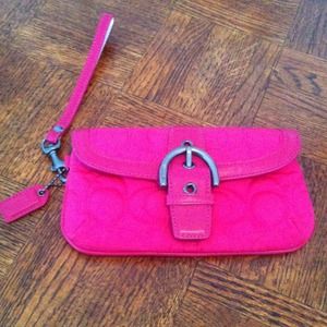 Hot pink authentic Coach Wristlet.