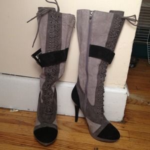 Grey and black knee high boots