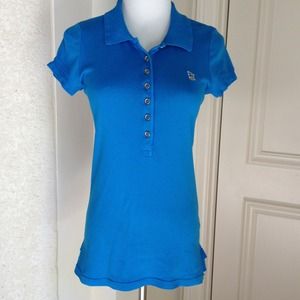 Juicy blue polo shirt .