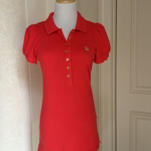 Juicy red polo shirt .