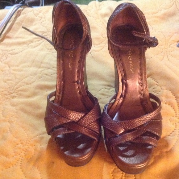 Gently worn bronze colored platforms