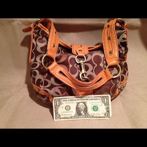 Brown Coach bag with Orange trim. Some wear
