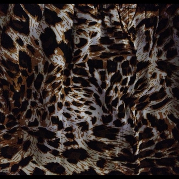 Animal print romper. Small with a ruffle top.