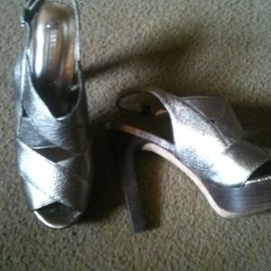 Bronze colored sling back heels