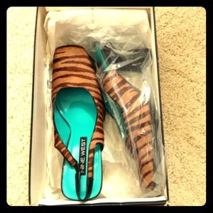 brown fur Nine West shoes.