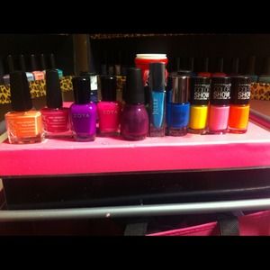 Lot of 21 brand name nail polishes.