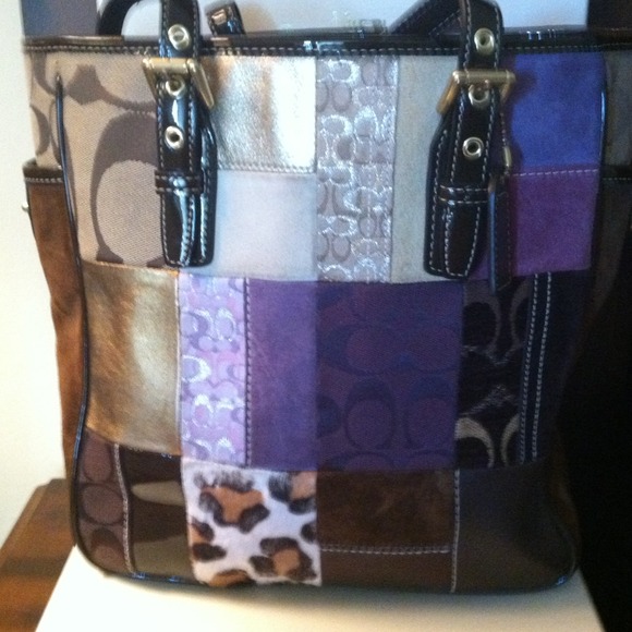 Limited Edition Coach leather, Sued side pockets