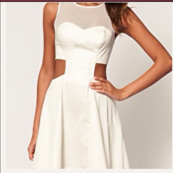 Mesh cut out dress.  ASOS brand. Still have tags