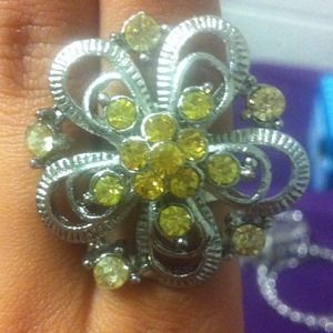 Flower ring with yellow accents