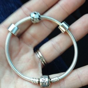 Pandora Bracelet with two clips and one charm