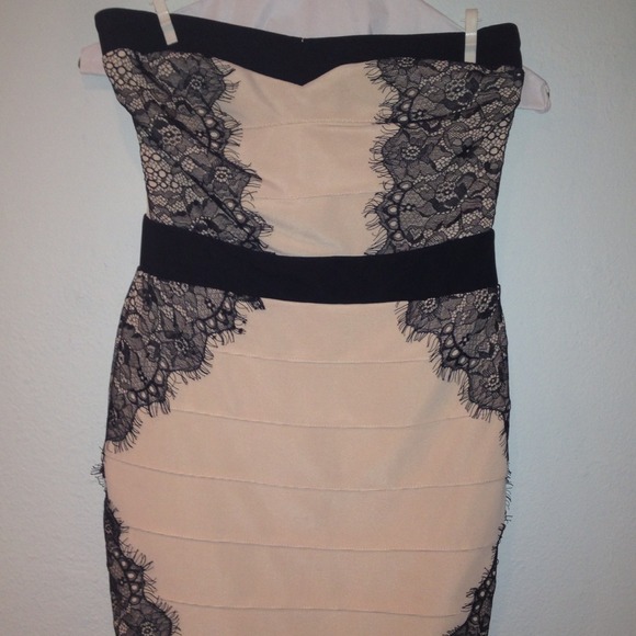 Beautiful nude and black dress. Size 4.