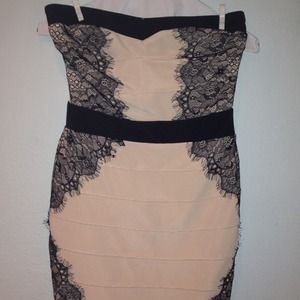 Beautiful nude and black dress. Size 4.