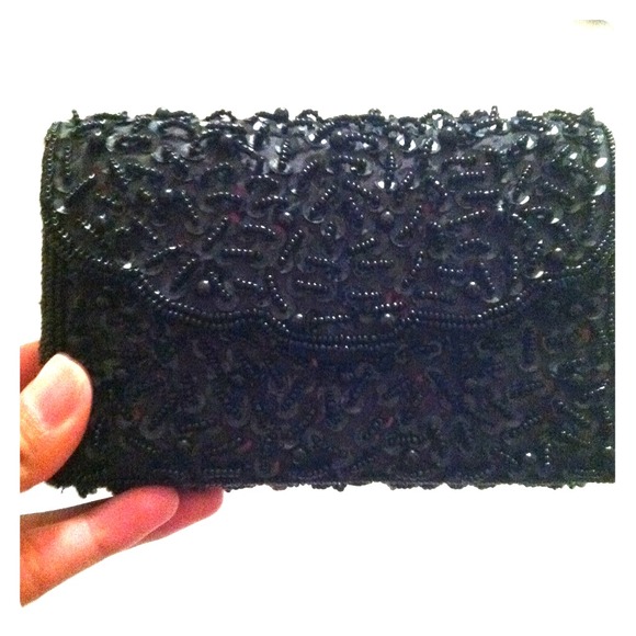 Black wallet for party.